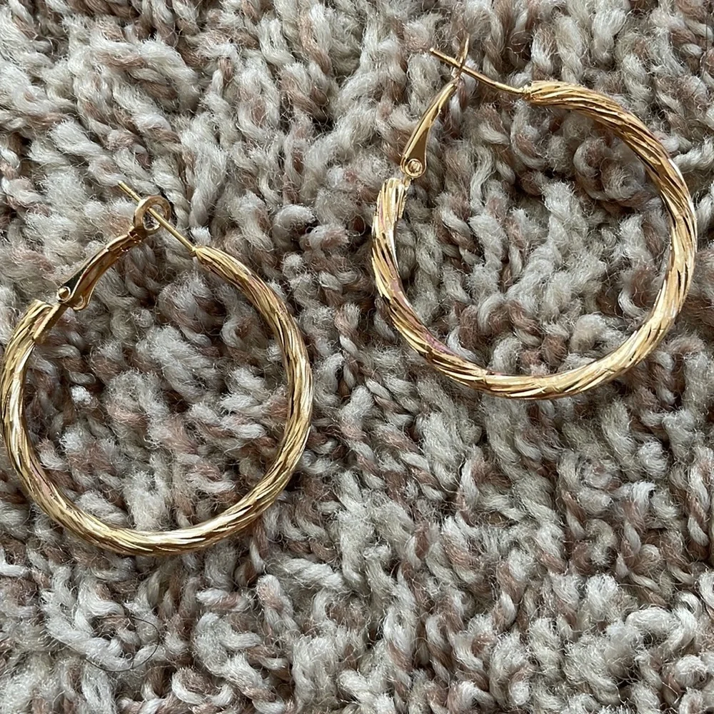 Small textured gold hoop earrings
